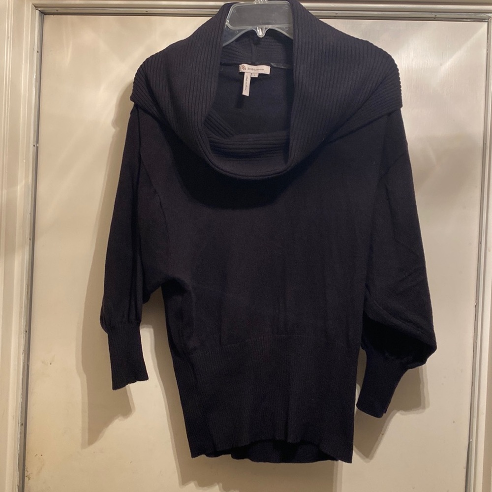 Lady’s black BCBG Sweater